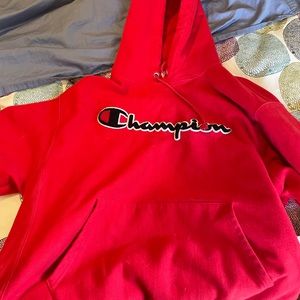 Red embroidered Champion hoodie. Barely worn. Size XL. Perfect condition.